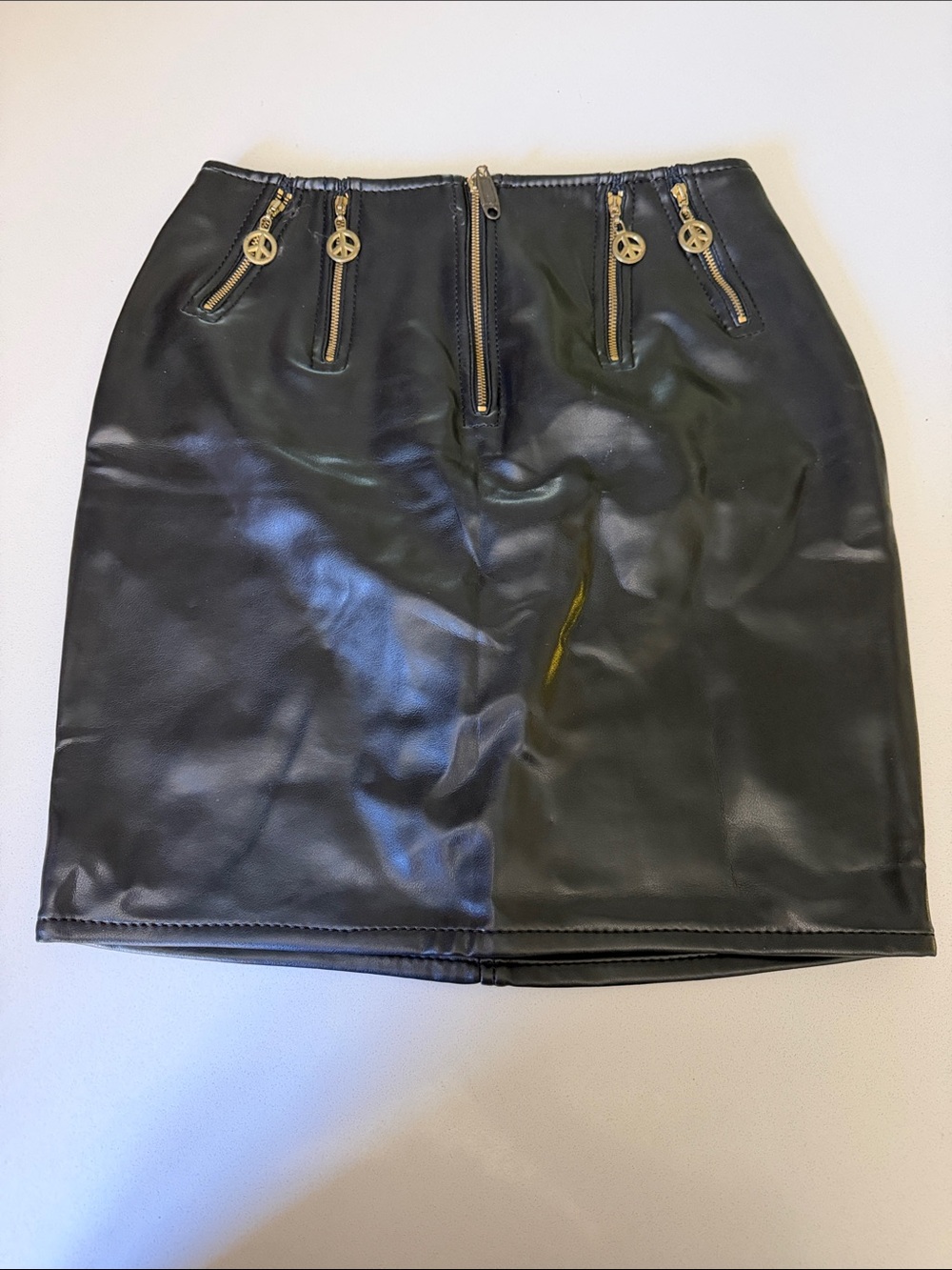 Vintage Moschino Black Faux Leather Mini Skirt with Gold Peace Sign Zippers